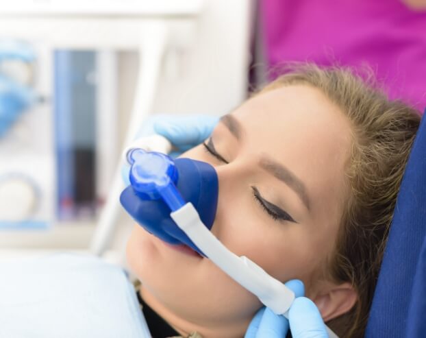 Relaxed dental patient under oral conscious sedation dentistry