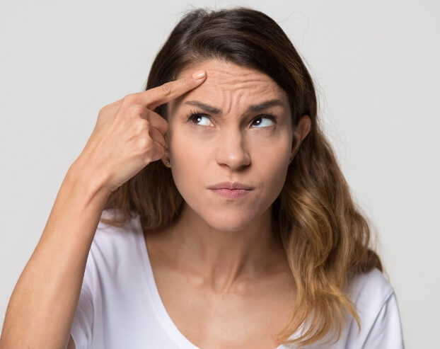 Woman with wrinkles on her forehead