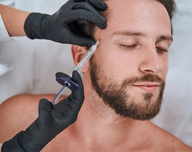 Man receiving dermal filler injection