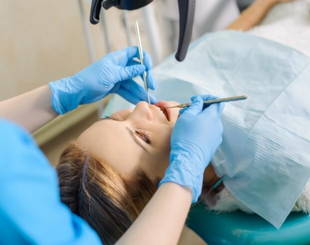 Dental patient receiving root canal therapy