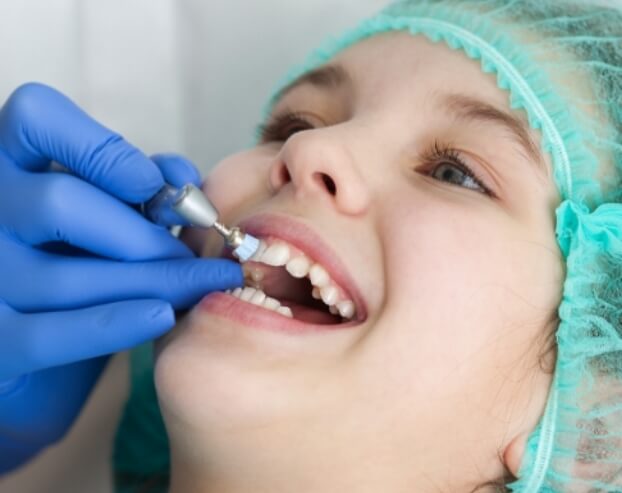 Patient receiving fluoride treatment