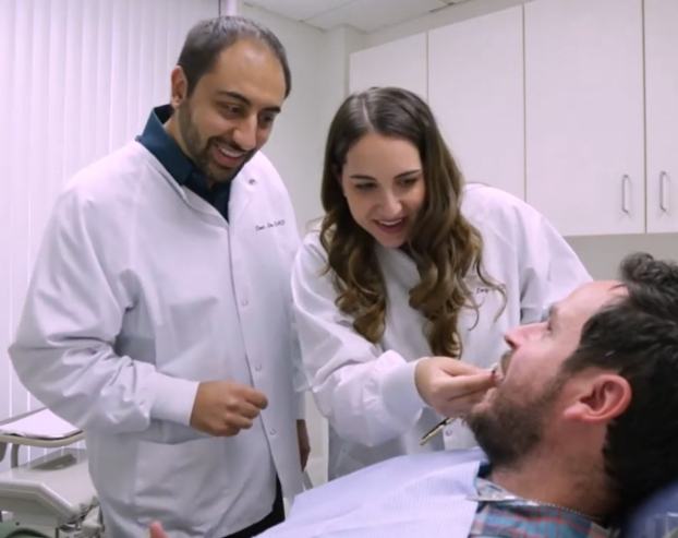 Dentists treating dental patient