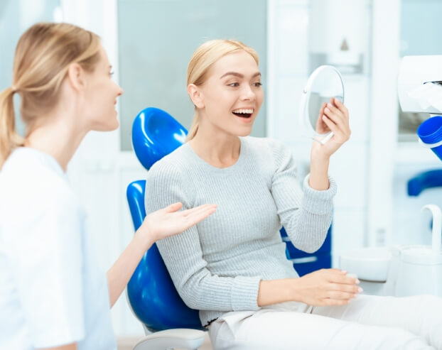 Patient enjoying the benefits of dental bonding