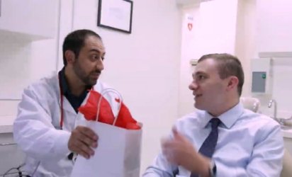 Dentist and patient discussing caring for dental implants