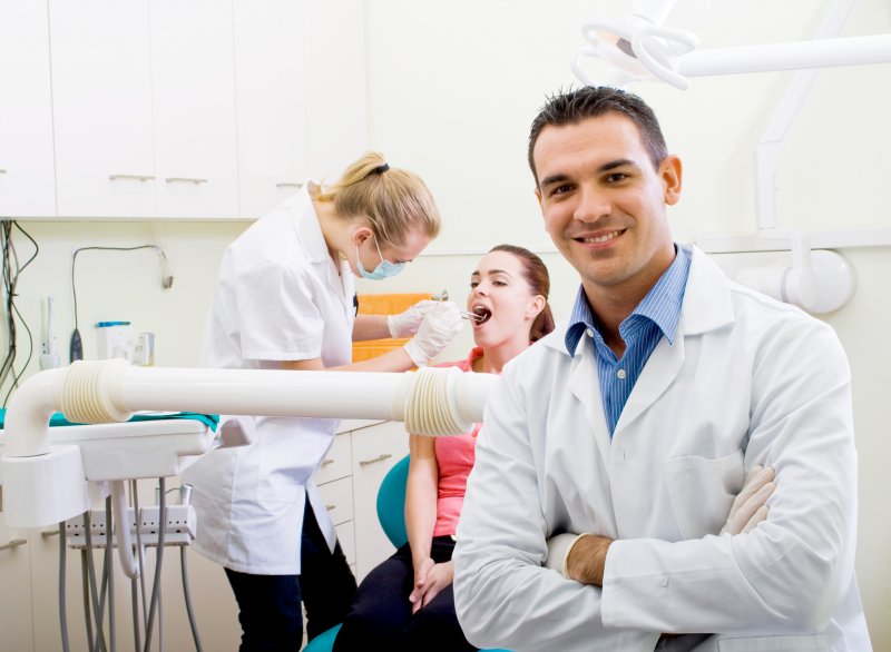 Dentists serving care in a multi-specialty practice in Downtown Boston.