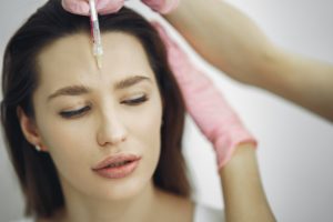 Woman getting Botox in downtown Boston