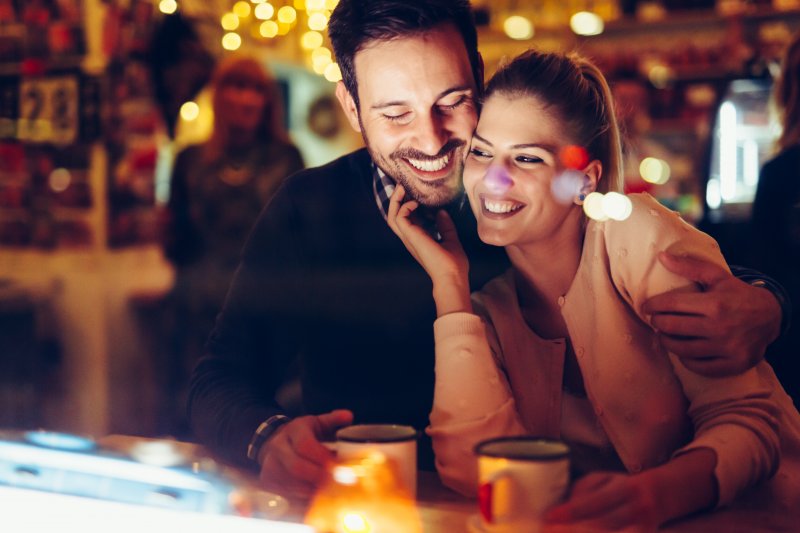 couple on date with teeth whitening in downtown Boston