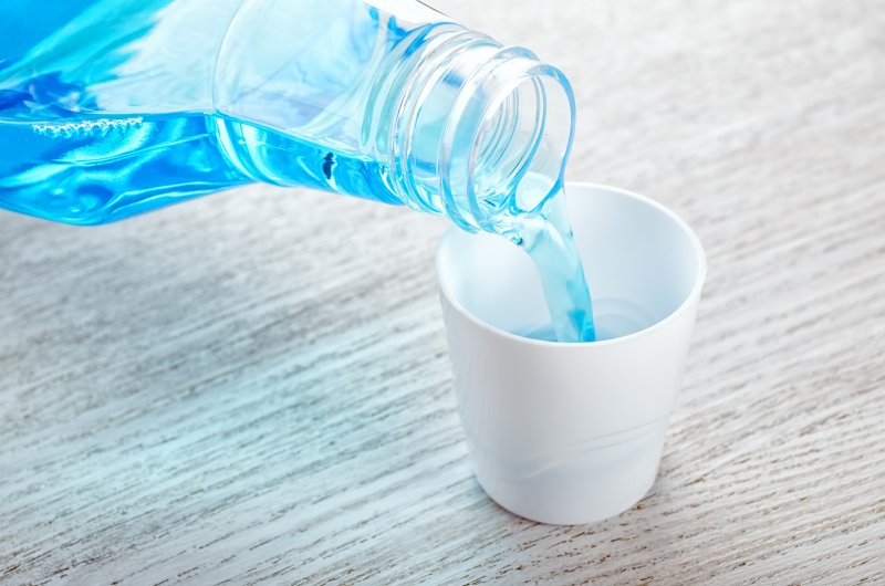 closeup of mouthwash being poured